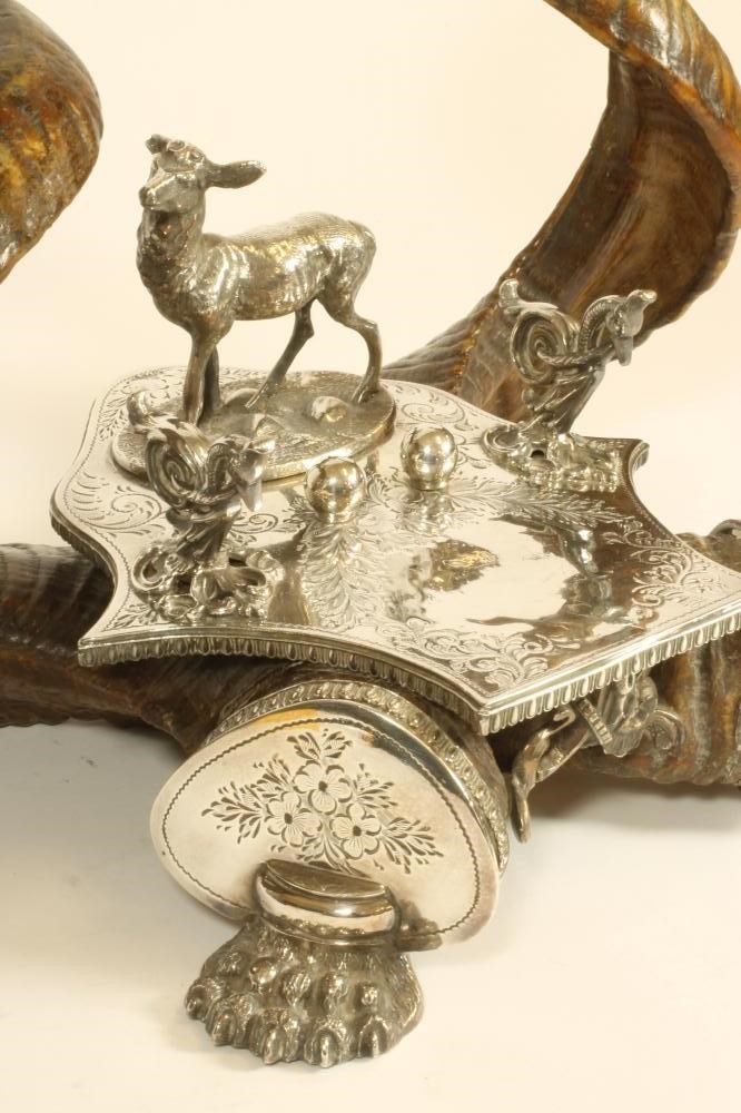 A VICTORIAN RAM'S HORN DESK STAND Image