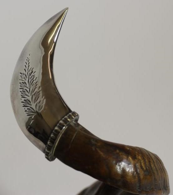 A VICTORIAN RAM'S HORN DESK STAND Image