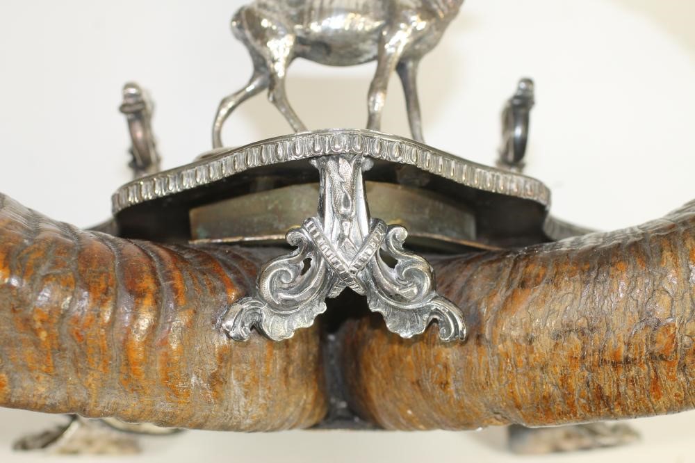 A VICTORIAN RAM'S HORN DESK STAND Image