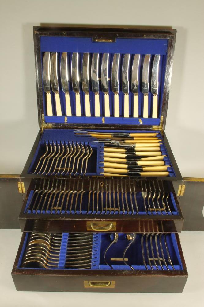 AN EDWARDIAN SILVER PLATED TABLE SERVICE for twelve place settings in Old English pattern Image