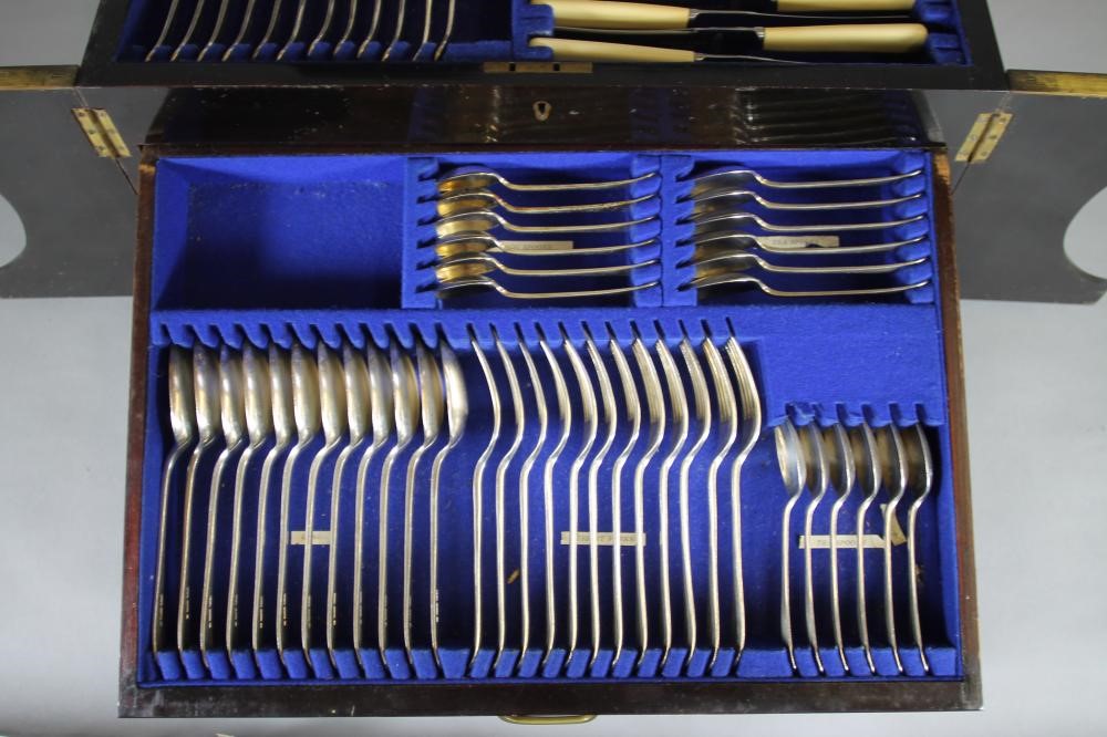 AN EDWARDIAN SILVER PLATED TABLE SERVICE for twelve place settings in Old English pattern Image