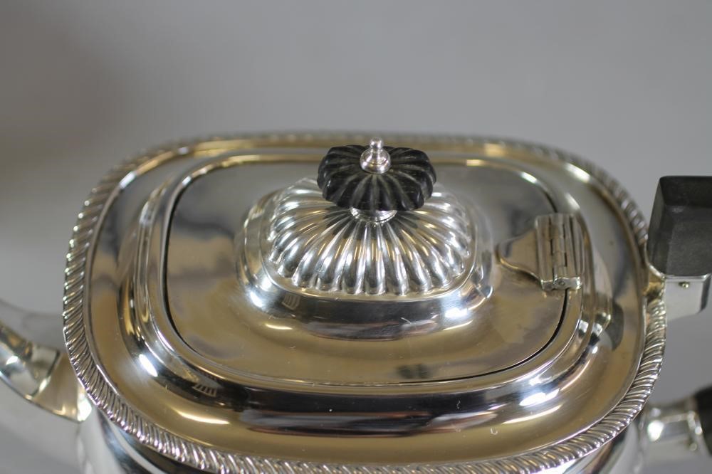 A MATCHED THREE PIECE SILVER TEA SERVICE Image