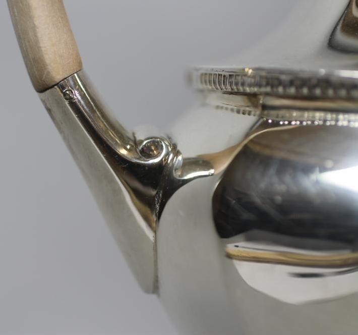 A THREE PIECE SILVER TEA SERVICE Image