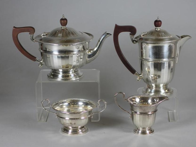 A FOUR PIECE SILVER TEA AND COFFEE SERVICE Image
