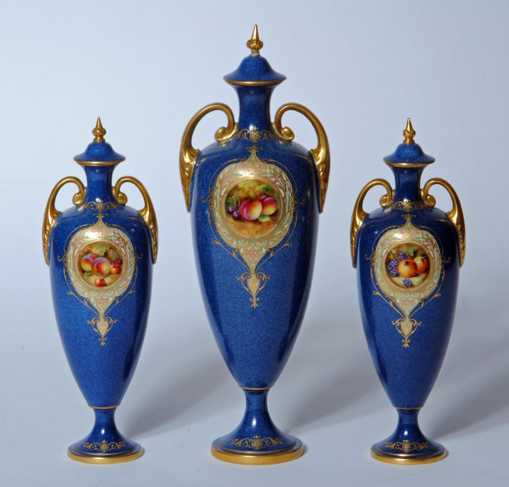 A ROYAL WORCESTER CHINA COMPOSITE THREE PIECE MANTEL GARNITURE Image