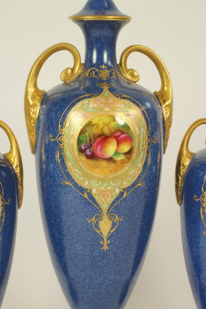 A ROYAL WORCESTER CHINA COMPOSITE THREE PIECE MANTEL GARNITURE Image