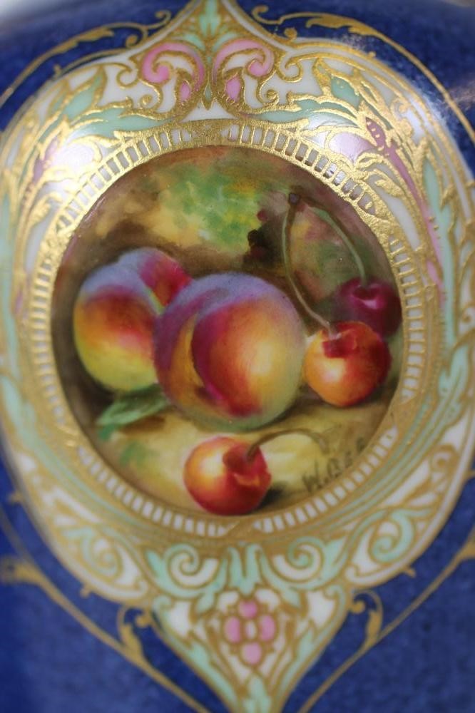 A ROYAL WORCESTER CHINA COMPOSITE THREE PIECE MANTEL GARNITURE Image