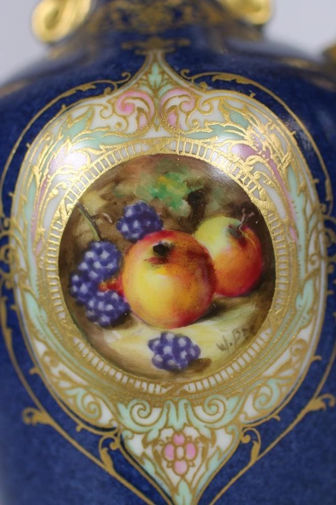 A ROYAL WORCESTER CHINA COMPOSITE THREE PIECE MANTEL GARNITURE Image