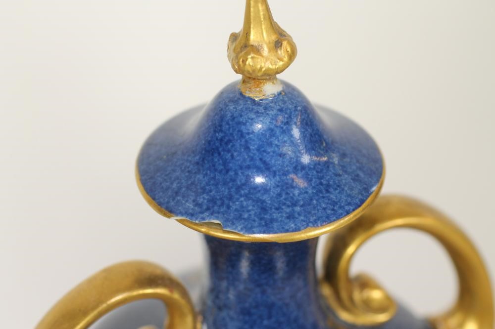 A ROYAL WORCESTER CHINA COMPOSITE THREE PIECE MANTEL GARNITURE Image