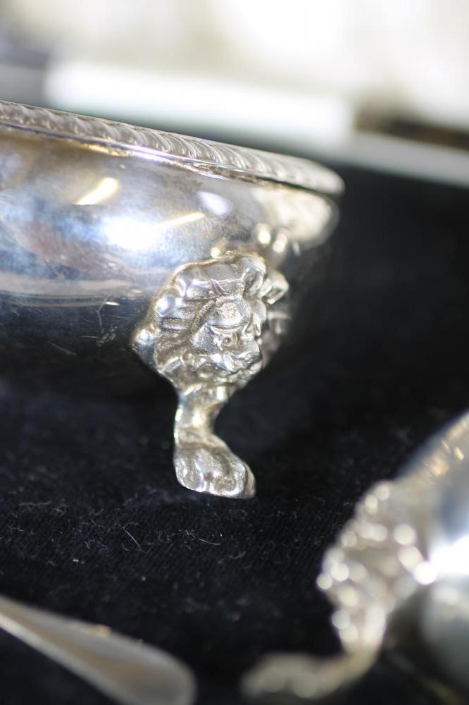 A THREE PIECE SILVER CRUET Image