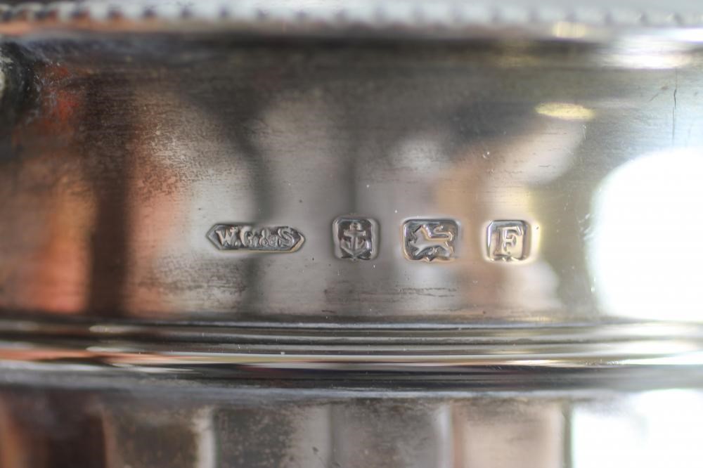 A THREE PIECE SILVER TEA SERVICE Image