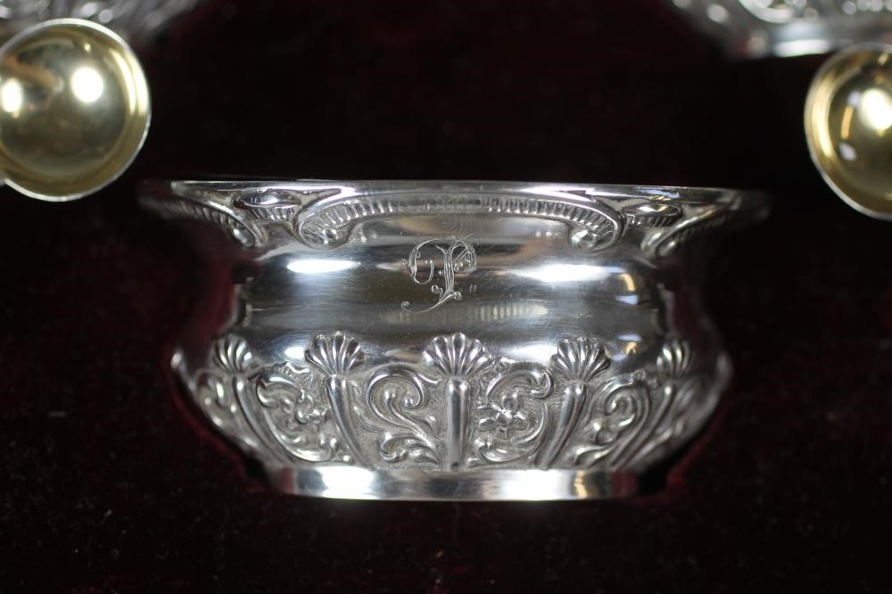 A SET OF FOUR LATE VICTORIAN SILVER SALTS Image