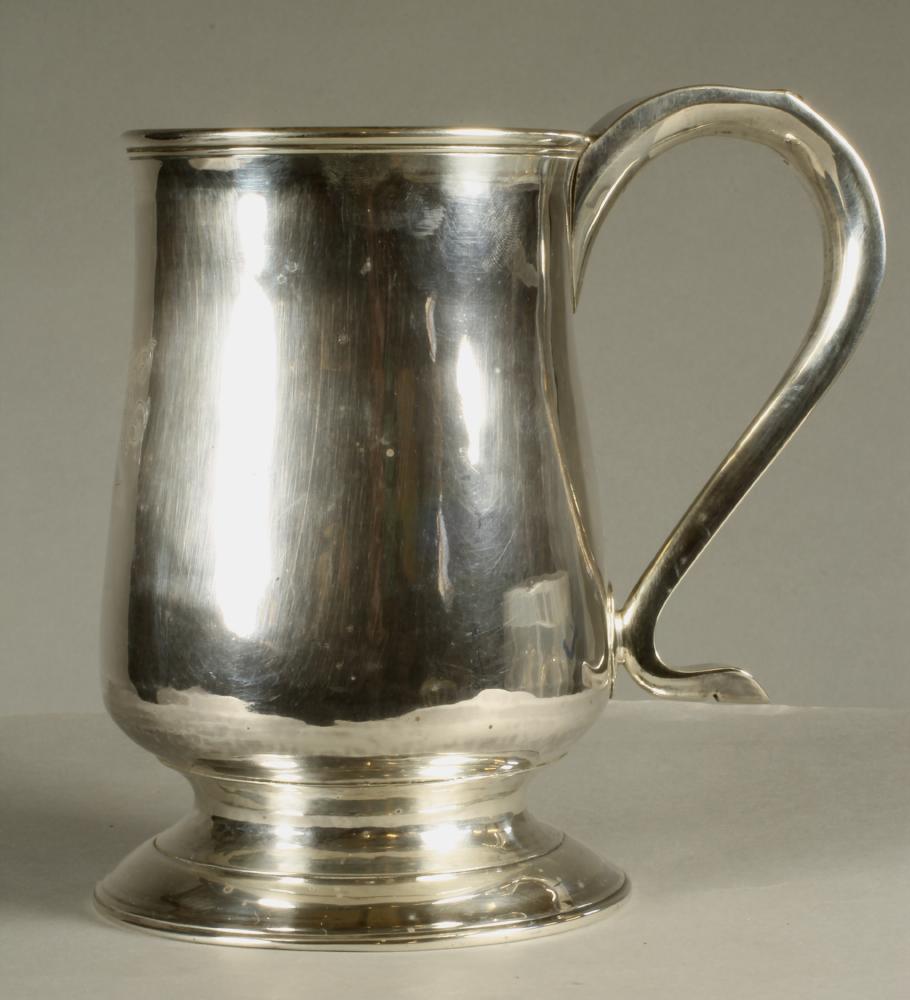 A LATE GEORGE III SILVER MUG Image