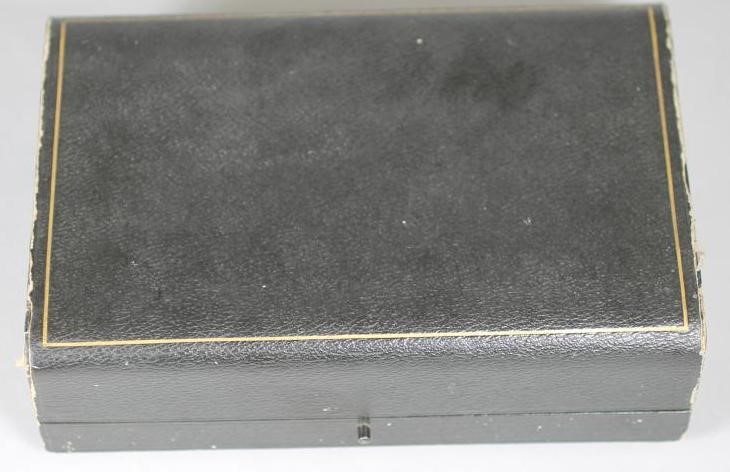 A SET OF SIX EDWARDIAN SILVER NAPKIN RINGS Image