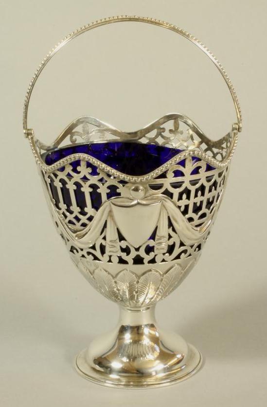 A LATE VICTORIAN SILVER SUGAR BASKET Image