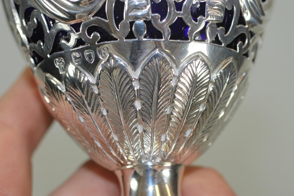 A LATE VICTORIAN SILVER SUGAR BASKET Image