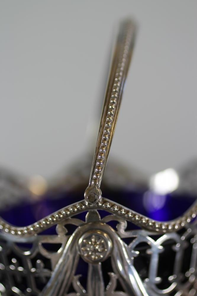 A LATE VICTORIAN SILVER SUGAR BASKET Image