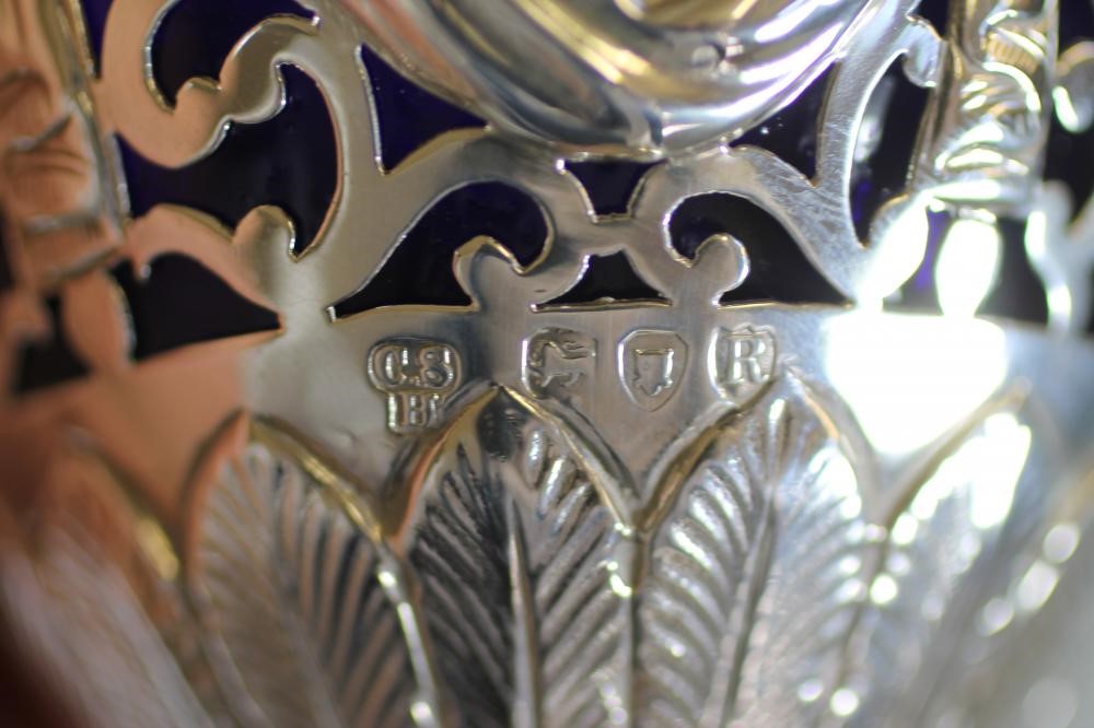 A LATE VICTORIAN SILVER SUGAR BASKET Image