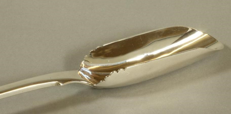 A GEORGE IV SILVER CHEESE SCOOP Image