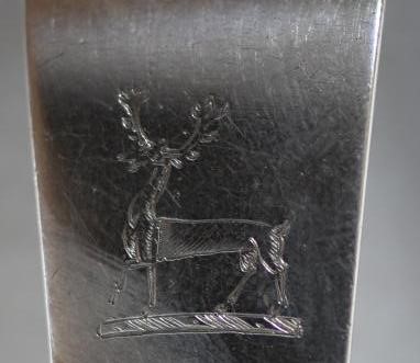 A GEORGE IV SILVER CHEESE SCOOP Image