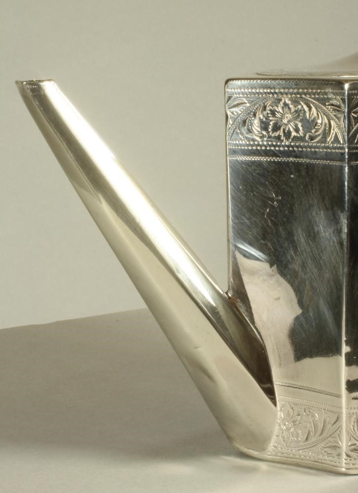 A LATE GEORGE III SILVER TEAPOT Image