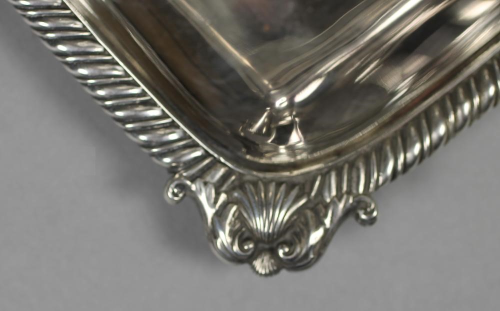 A LATE GEORGE III SILVER CHAMBERSTICK Image