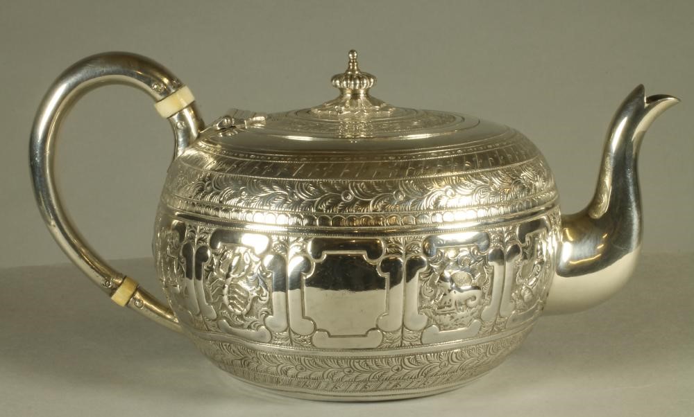 A VICTORIAN SILVER INDIANESQUE TEAPOT Image