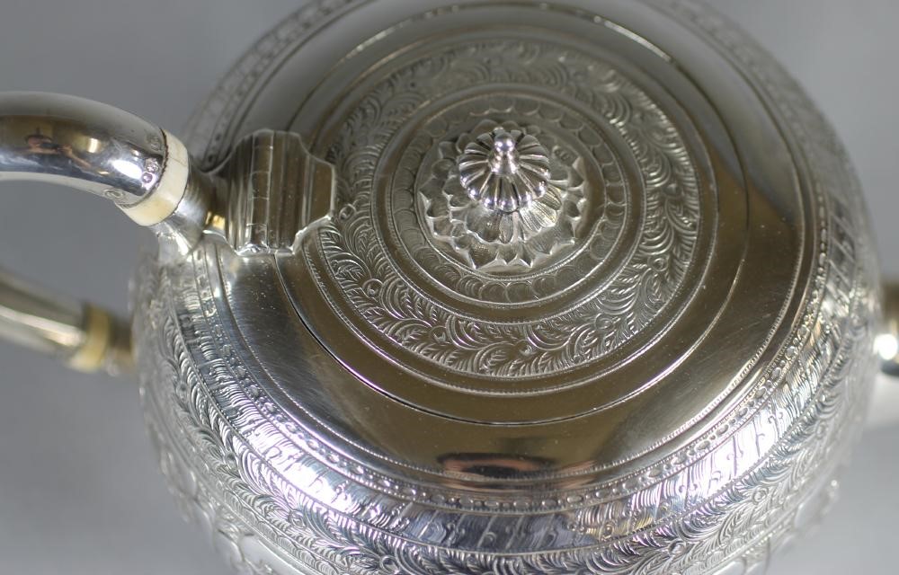 A VICTORIAN SILVER INDIANESQUE TEAPOT Image