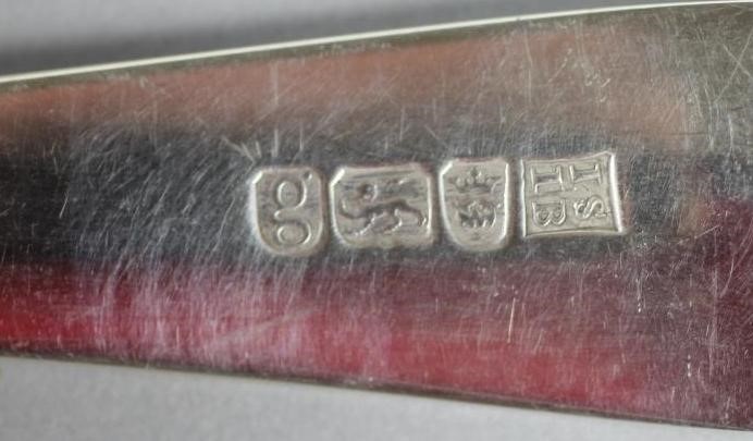 A GEORGE III SILVER BASTING SPOON Image