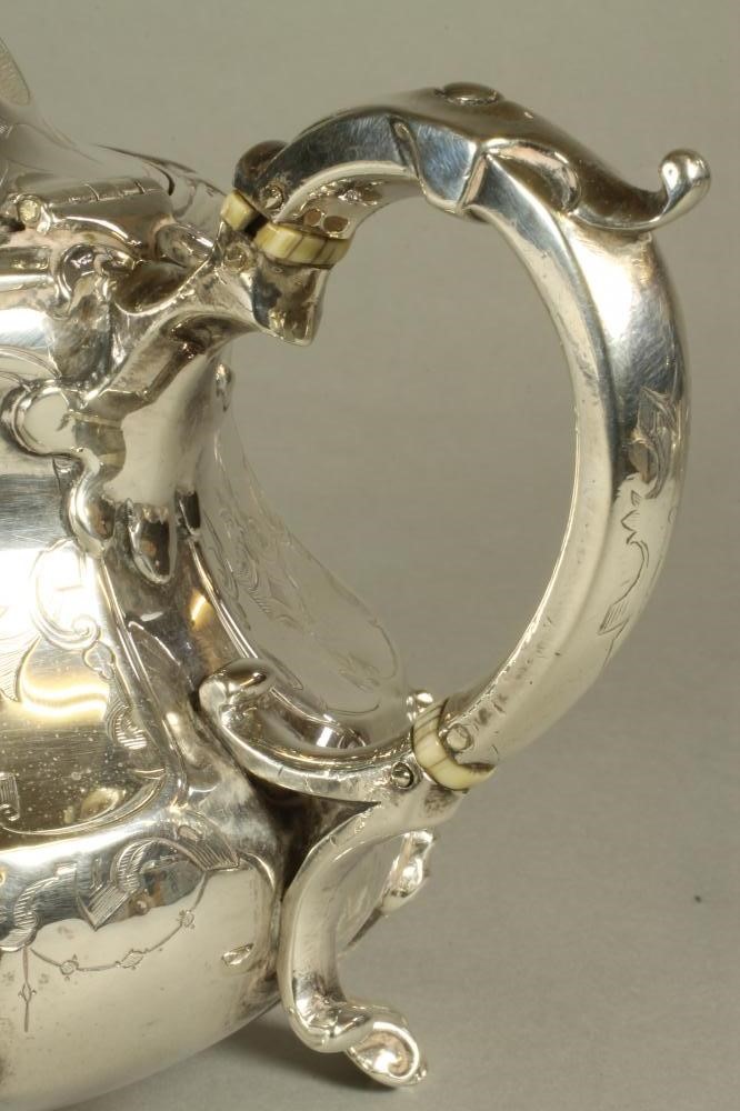 A VICTORIAN SILVER TEAPOT Image