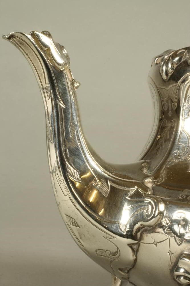 A VICTORIAN SILVER TEAPOT Image