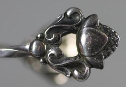 A PAIR OF GEORG JENSEN SILVER SUGAR NIPS Image