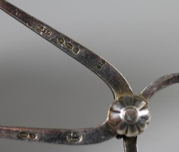 A PAIR OF GEORG JENSEN SILVER SUGAR NIPS Image