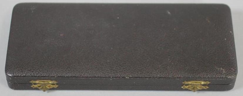 A FOUR PIECE SILVERED DESK SET Image