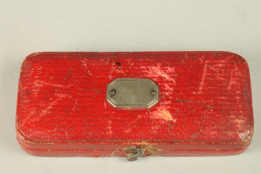 A GEORGE IV FOLDING SILVER FRUIT KNIFE AND FORK Image