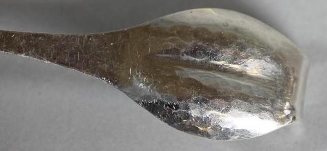 A PAIR OF LATE VICTORIAN SILVER AND IVORY KNIFE RESTS Image