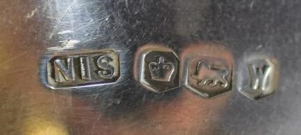 A PAIR OF LATE VICTORIAN SILVER AND IVORY KNIFE RESTS Image