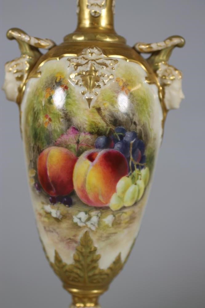 A MATCHED PAIR OF ROYAL WORCESTER CHINA VASES Image