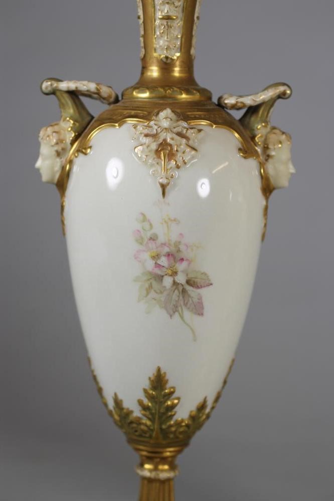 A MATCHED PAIR OF ROYAL WORCESTER CHINA VASES Image