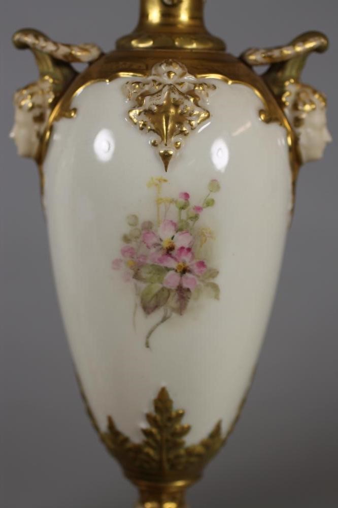A MATCHED PAIR OF ROYAL WORCESTER CHINA VASES Image