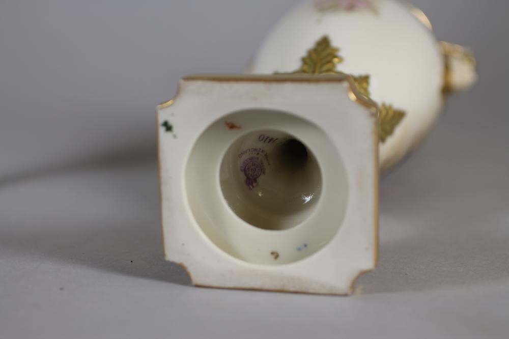 A MATCHED PAIR OF ROYAL WORCESTER CHINA VASES Image