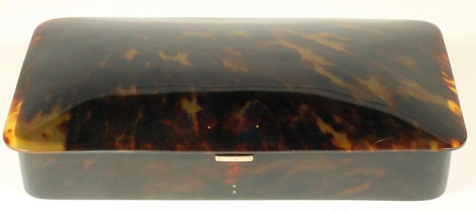 A TORTOISESHELL DRESSING TABLE BOX with silver hinges Image