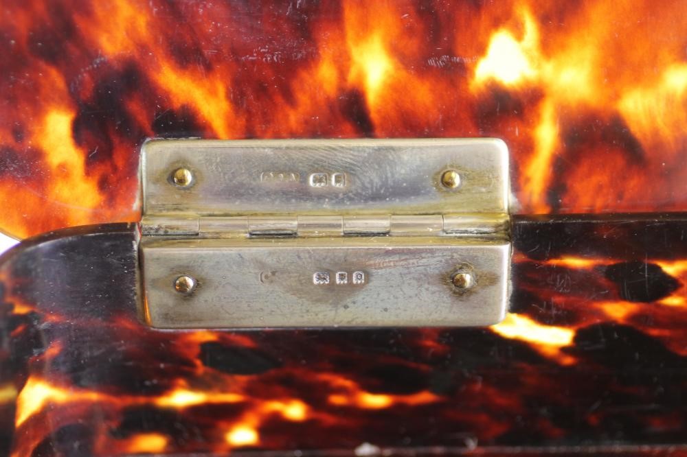 A TORTOISESHELL DRESSING TABLE BOX with silver hinges Image