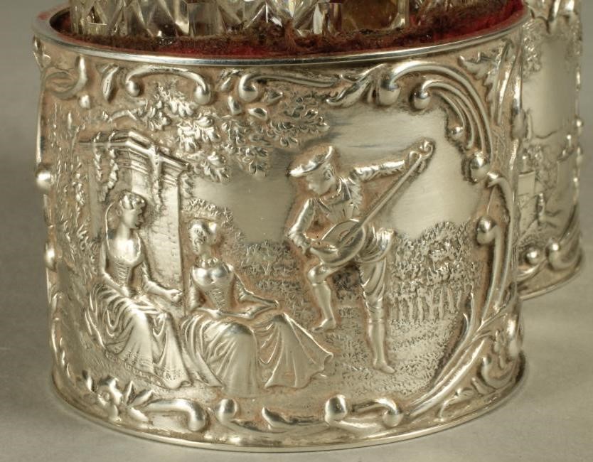 A PAIR OF LATE VICTORIAN GLASS TOILET BOTTLES of plain cylindrical form with hobnail cutting Image