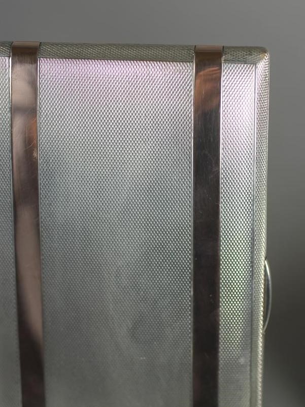 A SILVER CIGARETTE CASE Image