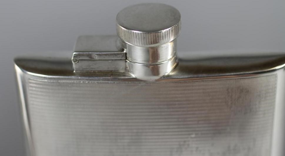 A SILVER CIGARETTE CASE Image