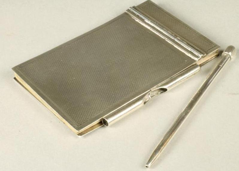 AN ART DECO SILVER AIDE MEMOIRE Image