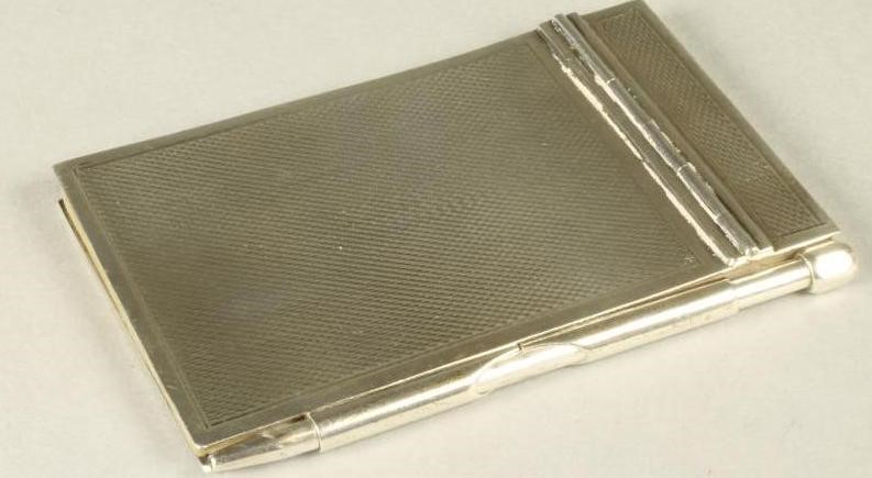 AN ART DECO SILVER AIDE MEMOIRE Image