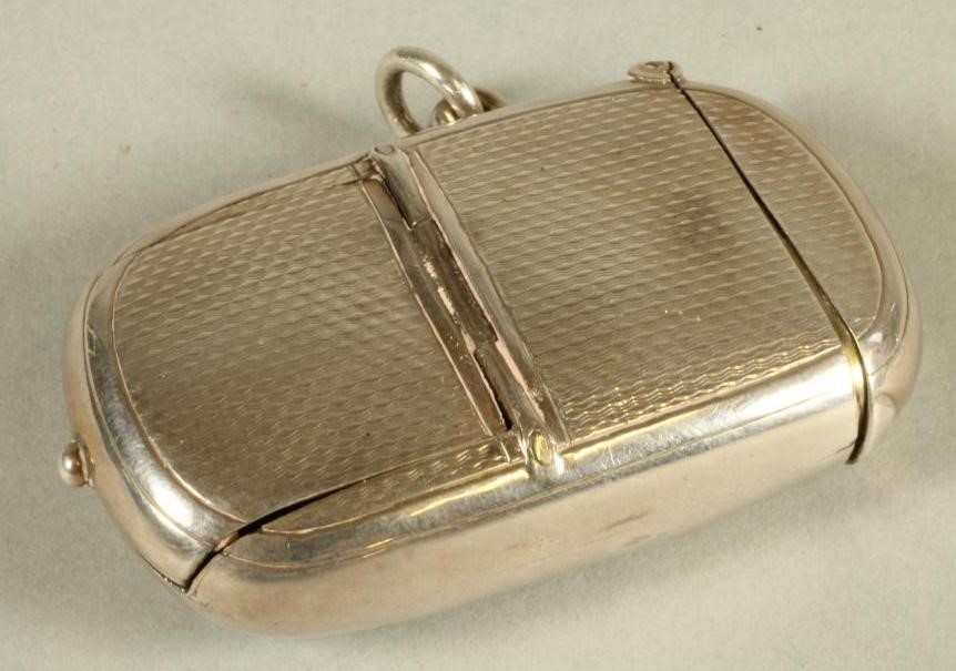 A LATE VICTORIAN SILVER VESTA/SOVEREIGN CASE Image