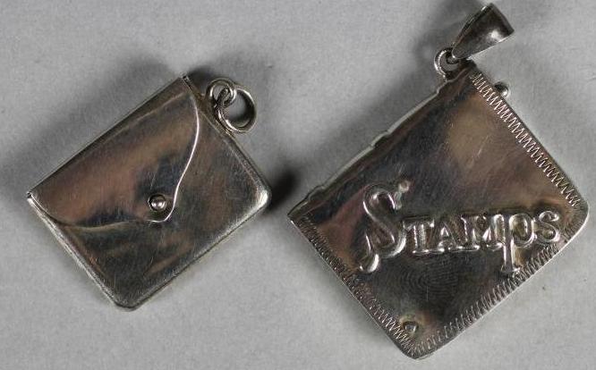 TWO STERLING SILVER STAMP HOLDERS Image